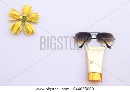 Sunscreen Spf50 For Skin Face With Sunglasses Accessories Of Lifestyle Woman Relax Summer And Ylang 