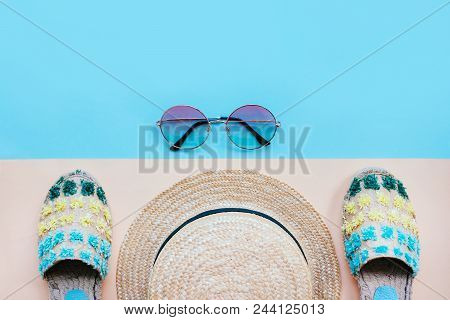 Summer Fashion Flatlay With Espadrille Sandals, Gradient Round Sunglasses And Straw Hat On The Two-t
