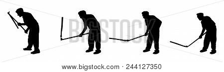 Silhouette Of Country Man Threshing Wheat By Hand.