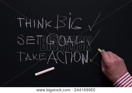 For Success Think Big, Then Set Goal And Necessarily Take Action. Man Writes On The Board The Rules 