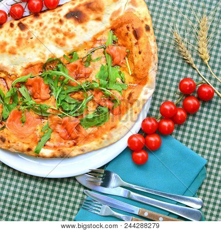The Fflat-lay Of Pizza With Ingredients On A Table