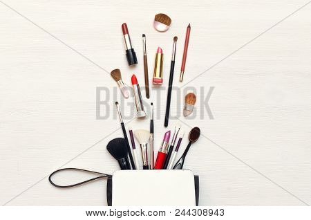 Make Up Or Visage Background. Female Bag And Different Make Up Accessories, Brushes, Lipstick, And P