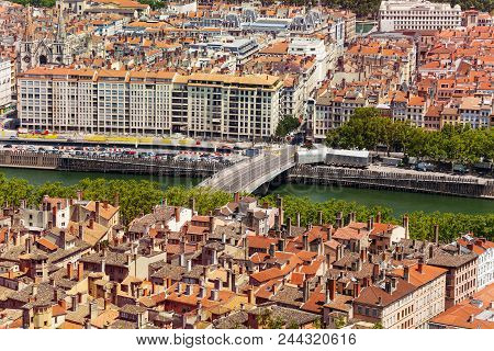 Aerial View Of Lyon Cityscape With Pont Marechal Juin Across The Saone River And Saint-nizier Church