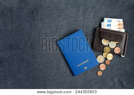 Blue Blank Biometric Passport On Gray Background With Euro Monay In Purse