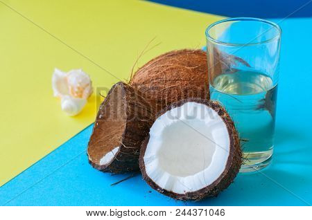 Whole Coconuts And Coconut Water . Doutone Background.