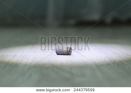 Sleeve From The Gun Lies On The Floor Of The House, Close-up, Cartridge
