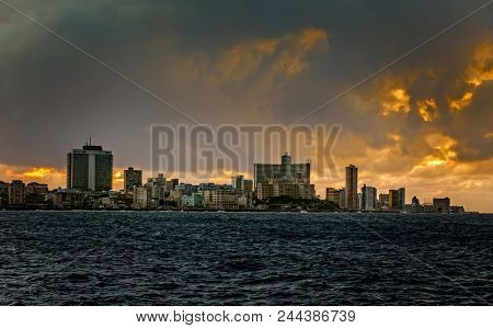 Sunset Clouds And View To Malecon Promenade Street And Vedado District, Havana, Cuba