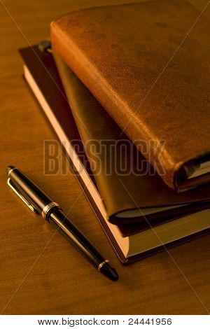 Stift und Bücher