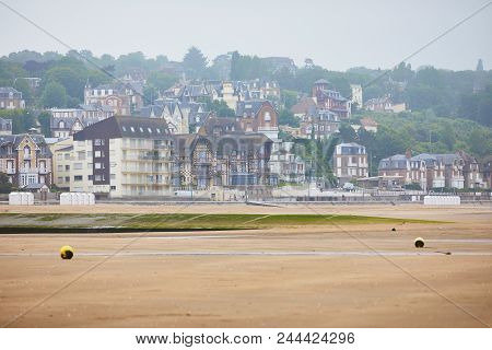 View Of Villers-sur-mer In Lower Normandy, France On A Foggy Day At Low Tide