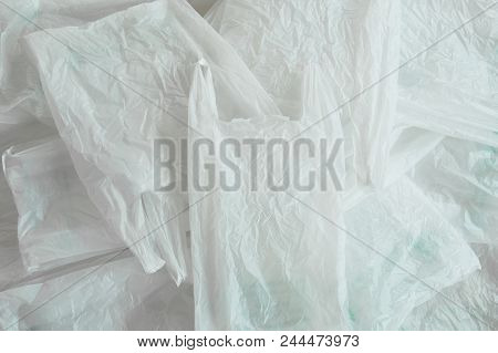 Close Up Og White Plastic Bag Packing Stacking On Floor
