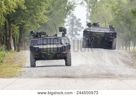 German Light Armoured  Reconnaissance Vehicle Drives On A Road
