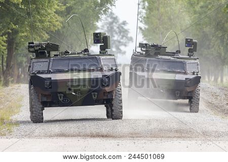 German Light Armoured  Reconnaissance Vehicle Drives On A Road