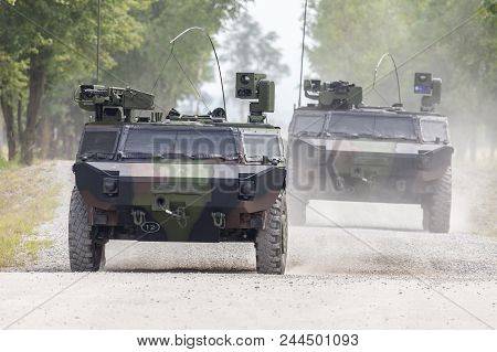 German Light Armoured  Reconnaissance Vehicle Drives On A Road