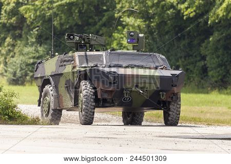 German Light Armoured  Reconnaissance Vehicle Drives On A Road