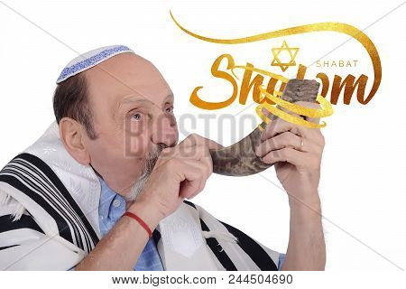 Eldery Jewish Man Blowing The Shofar Horn For Rosh Hashanah