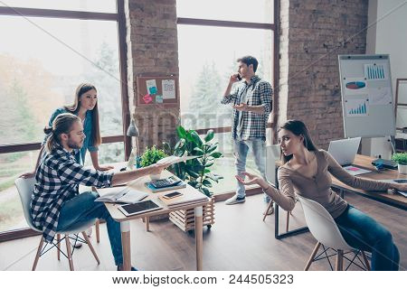 Common Workday Process In Office - Concentrated, Serious Colleagues At Work, Talking On Smart Phone,