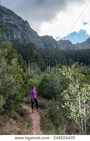 Female Trailrunner On A Winters Day