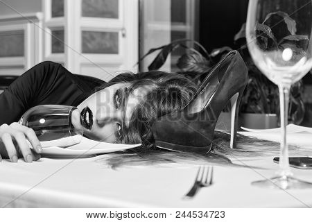 Fashion Model Posing On Camera. Sensual Elegant Glamour Young Drunk Woman With Beautiful Hair Lying 