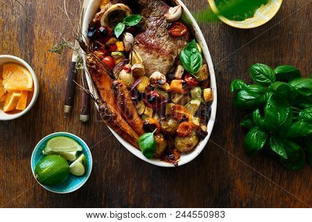 Beef Meat Baked With Vegetables (potatoes, Carrots, Eggplant, Zucchini And Tomato) In Ceramic Pot On