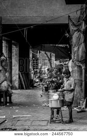 Mumbai, India - December 12, 2014 - Travelers Are Locals Alike Are Attracted To Mumbai Street Food A