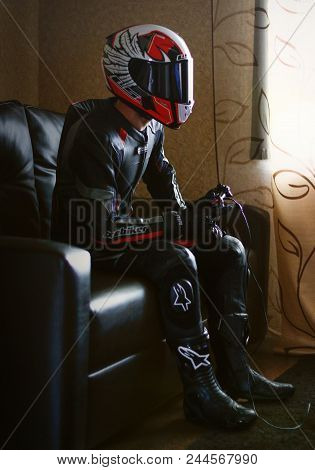 Krasnoyarsk, Russia - May 24, 2018: Beautiful Motorcyclist Playing On The Xbox