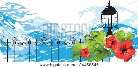 blomster og lanterne på baggrund af havet