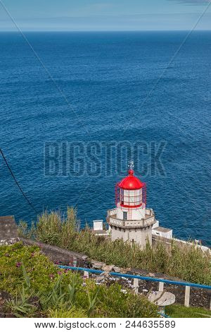 Lighthouse Arnel In Nordeste, Sao Miguel Island, Azores Islands, Portugal. Red Roof Of The Tower. Ho