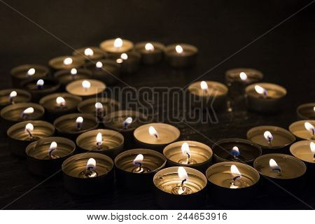 Symbols Of Islam. Candle Lights On Black Background. Abstract Isolated Photo.