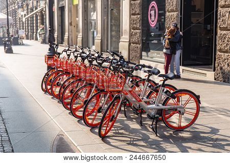 Milan, Italy - April 07, 2018: Yellow Mobike Bike Sharing Milan, A Row Of Bicycles On Street Early I