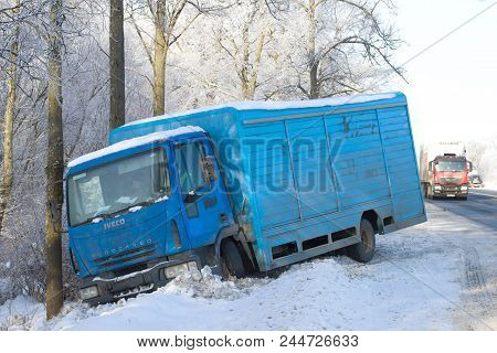 Leningrad Region, Russia - February 21, 2018: The Iveco Eurocargo 120el17 Truck In A Ditch On The Wi