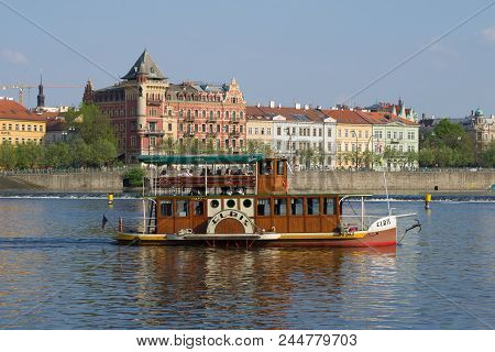 Prague, Czech Republic - April 22, 2018: Pleasure Steamer On The Background Of The Spring Embankment
