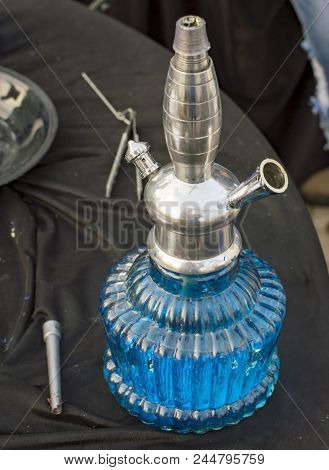 Blue Hookah With Shining Top And Open Pipes