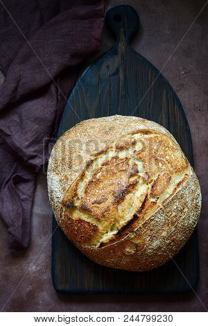 Fresh Homemade Bread On A  Brown Background. Crisp. French Bread.  Bread At Leaven. Bread From Rye A