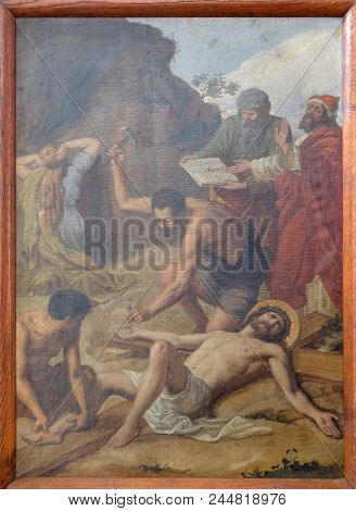SISAK, CROATIA - DECEMBER 07: 11th Stations of the Cross, Crucifixion: Jesus is nailed to the cross, Church of Visitation of the Virgin Mary in Sisak, Croatia, on December 07, 2017.