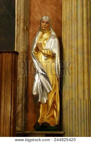 ZACRETJE, CROATIA - AUGUST 06: Virgin Mary, statue on the main altar in the Parish Church of the Holy Cross in Zacretje, Croatia on August 06, 2017.