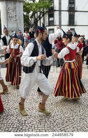 Funchal, Portugal - April 19, 2018:  Folk Musicians And Dancers Performing On The Avenida Arriaga  I