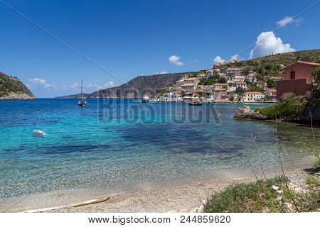 Assos, Kefalonia, Greece - May 25, 2015: Amazing Seascape Of Beach Of Assos Village And Beautiful Se