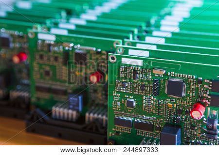 Closeup Of Lot Of Electronic Printed Circuit Boards With Lots Of Surface Mounted Components.horizont