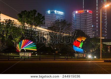 Xiamen, China - Apr 05, 2018: Brics And Emdcd Sculpture With Modern Skyscraper Background