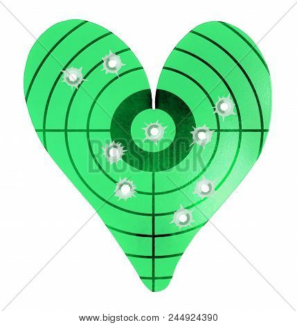 Bulletholes In A Metal Heart-shaped Target