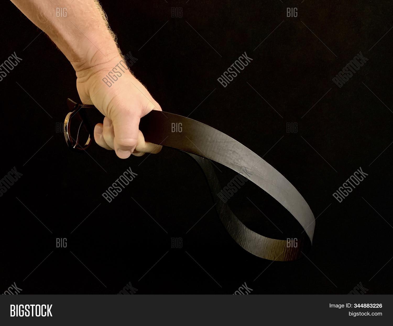 belt in hand