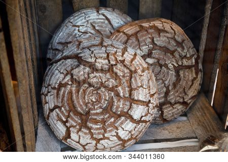 Freshly baked traditional German sourdough rye bread round loafs for sale at market in Rothenburg ob der Tauber, Bavaria, Germany, Europe