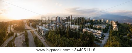 Aerial View Of Residential Buildings On Top Of Burnaby Mountain During A Vibrant Sunset. Taken In Gr