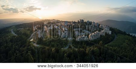 Aerial View Of Residential Buildings On Top Of Burnaby Mountain During A Vibrant Sunset. Taken In Gr