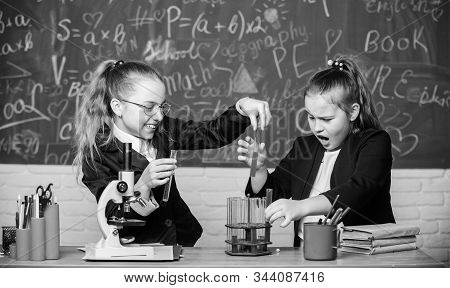 Microscope And Test Tubes On Table. Educational Experiment Concept. Be Careful Performing Chemical R