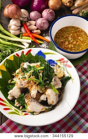 Steamed Fish With Boiled Dip, Thai Esan Local Food, Thailand.