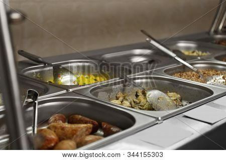 Containers With Tasty Food In School Canteen