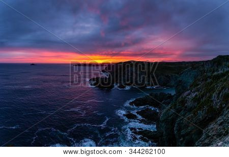 Striking Seascape View On A Rocky Atlantic Ocean Coast During A Colorful Sunrise. Taken At Crow Head
