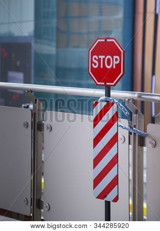 Traffic Safety Warning Signage, A Stop Restrictive Octagon Sign With Red, White Vertical Diagonal St