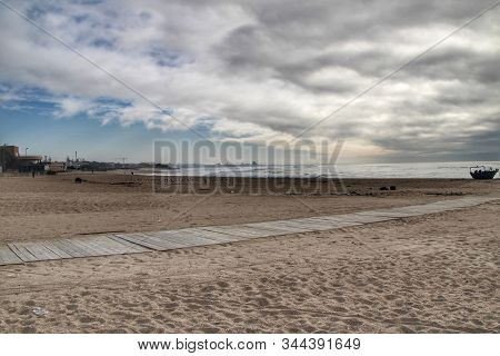 Aguda Beach Under Stormy Sky In Miramar, Porto, Portugal